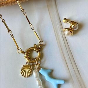 Stainless steel, Gold Plated necklace with pendants and front clasp with earr